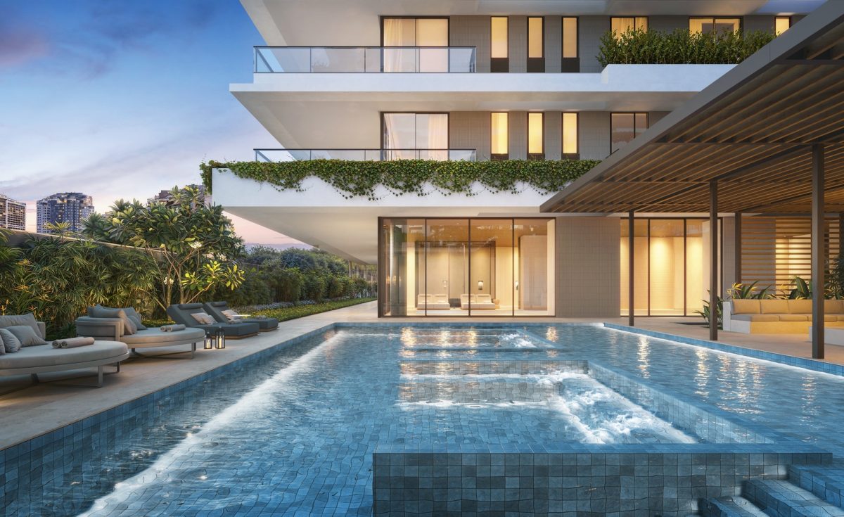 Sala moderna com sofá e mesa.